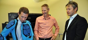 Paul van Donkelaar (middle) is working on a concussion-reducing sports helmet made out of impact-absorbing material
