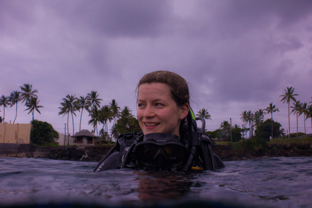 Andrea Reid surfacing after a dive on Moloka'i, Hawai'i
