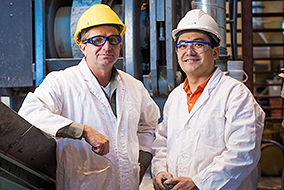 Mining engineering head Bern Klein (left) and Mongolian PhD student Zorig Davaanyam.