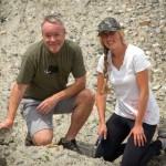 Rob Young shows recent grad Lisa Hettrich how he came across the humerus while looking for rocks in a gravel pile in Alberta