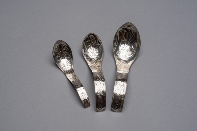 Three silver spoons with bear, killer whale and eagle motifs (left to right), circa 1959—all created by renowned Haida artist Bill Reid—are part of a collection donated to the Museum of Anthropology by late Calgary philanthropist Margaret (Marmie) Perkins Hess. Credit: Martin Dee/University of British Columbia