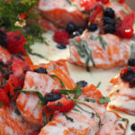 Ocean Wise wild salmon with local herbs and berries from Scholar's Catering.