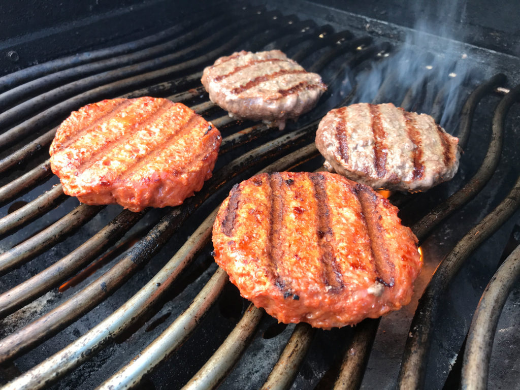Beyond Meat burgers cooked on the grill