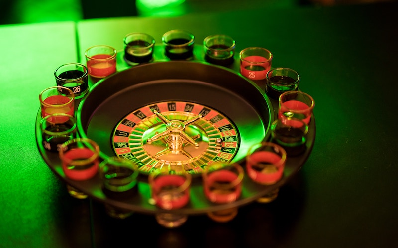 Roulette wheel with shot glasses