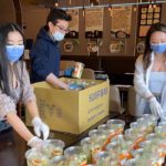 Patrisse Chan, Brian Chua and Prescilla Chan prepare to deliver 48 shake ramen buckets on behalf of restaurant partner Yuu Japanese Tapas. Credit: Phoebe Chan