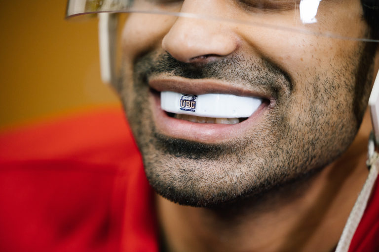 High-tech mouthguard tracks head impacts during varsity hockey playoffs