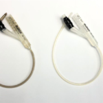 Photo of a coated versus an uncoated catheter. Credit: Kizhakkedathu Lab
