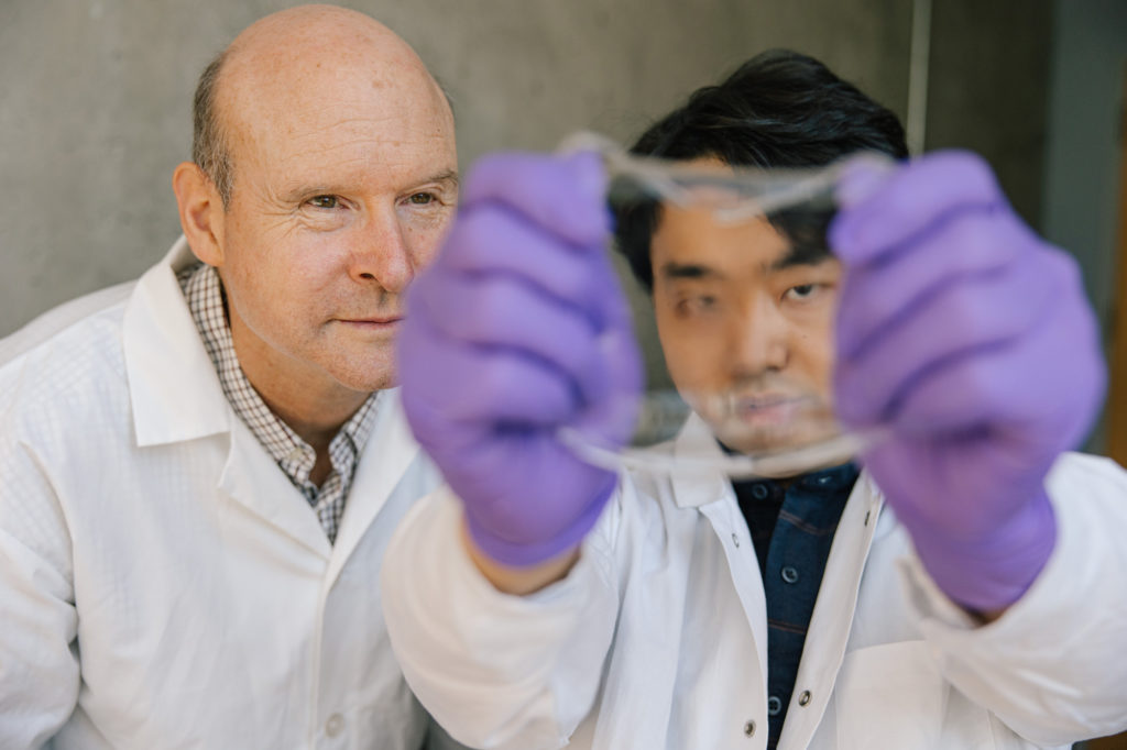 Dr. John Madden and Yuta Dobashi with one of the hydrogel sensors