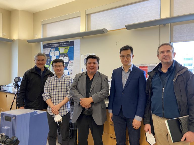 From left, Joe Wong, Yeling Zhu, Reg Ogen, Dr. Feng Jiang and James Redford