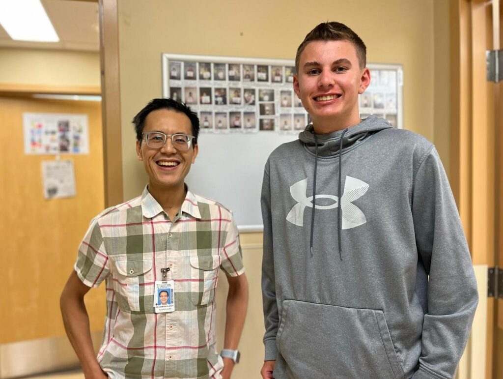 Dr. Edmond Chan poses with study participant Dario Filippelli.