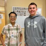 Dr. Edmond Chan (left) poses with study participant Dario Filippelli, who was all smiles after passing his oral food challenge. (Photo courtesy of Dr. Edmond Chan)