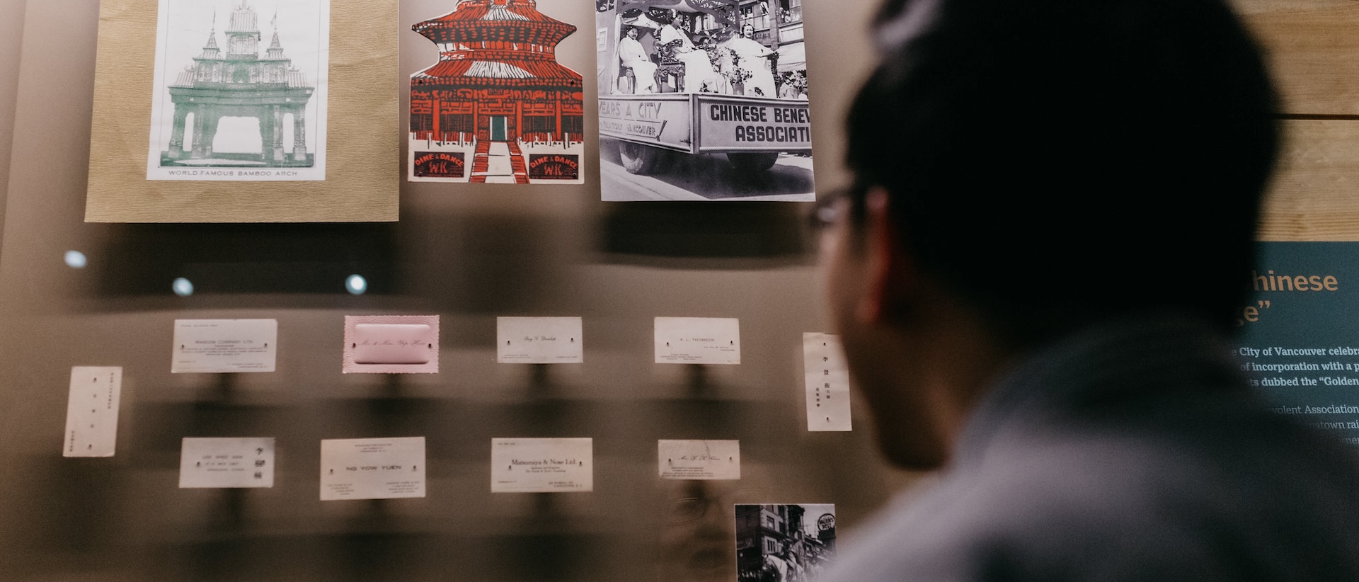 Visitor perusing exhibit in the Chung | Lind Gallery