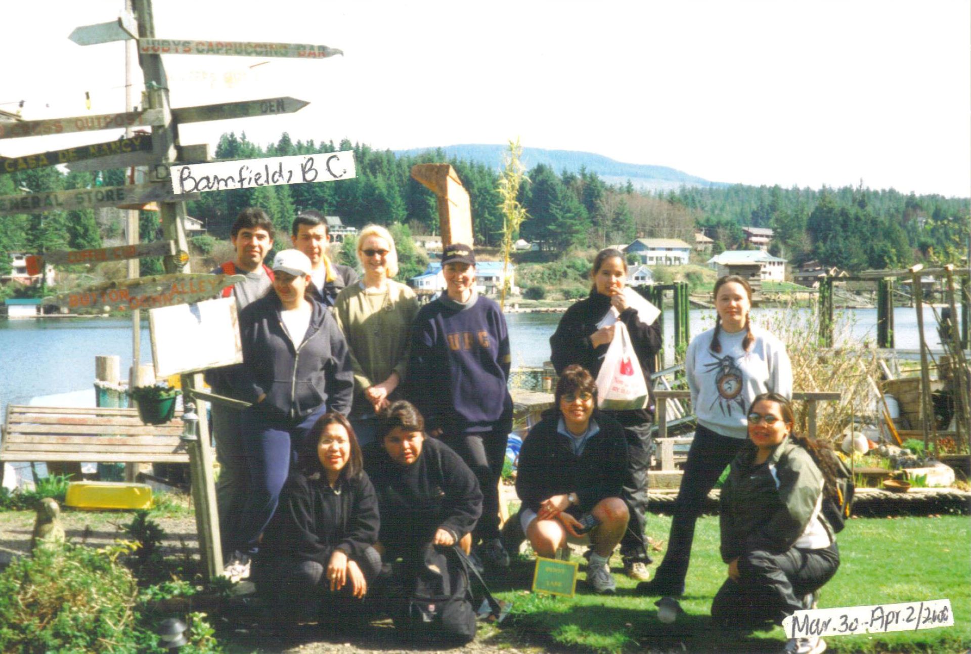 A group photo of 11 students from UBC Faculty of Education’s Indigenous Teacher Education Program. Photo dates back to March/April 2000. They are gathered outdoors posing for a photo.